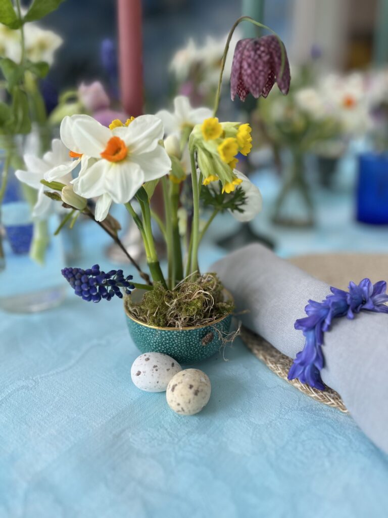 Close up of flowers and eggs on Easter table