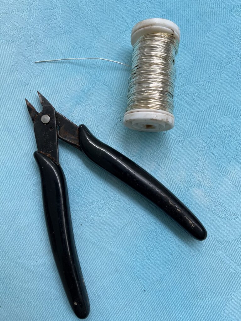 Wire cutters and spool of wire