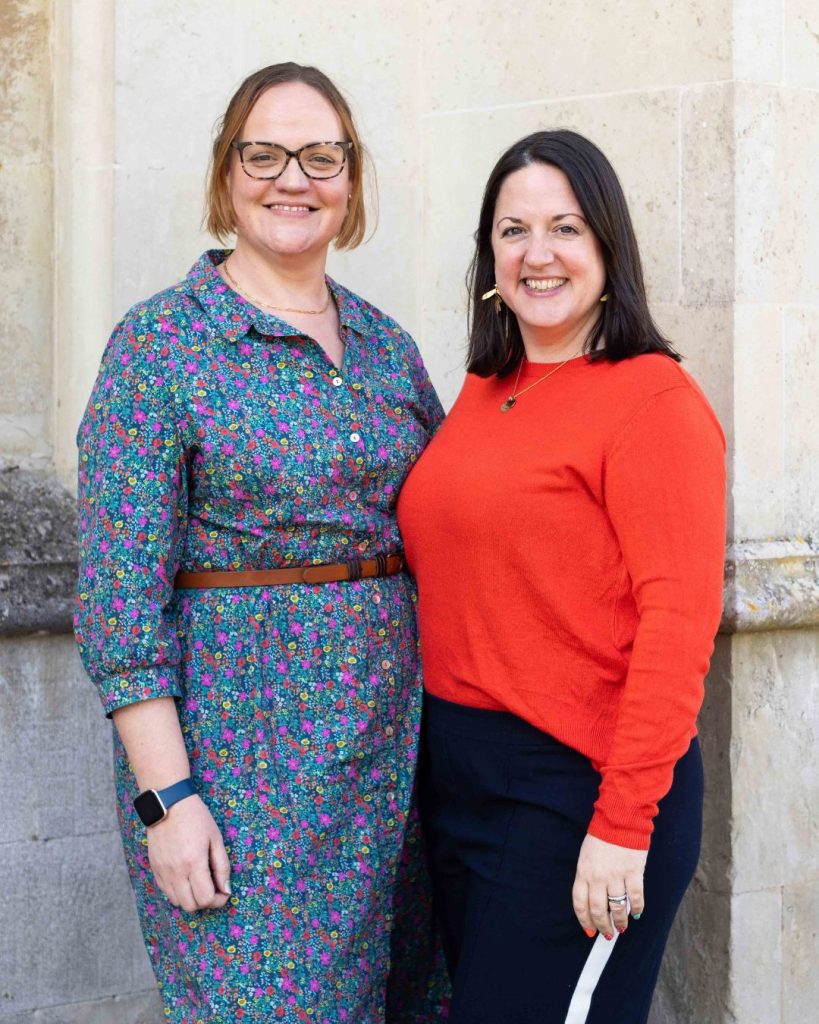 Corinne and Tanya Corinne and Tanya smiling at the camera